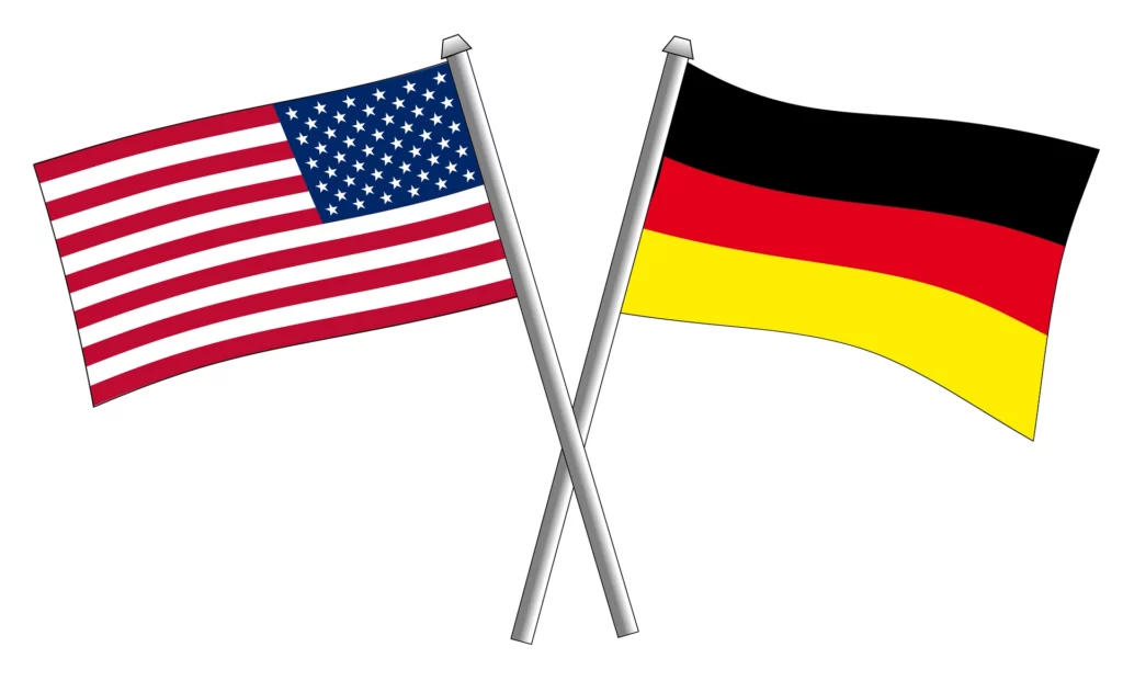 SIe sehen die Flaggen der US und Deutschland. Der Beitrag erklärt, was eine US LLC ist.